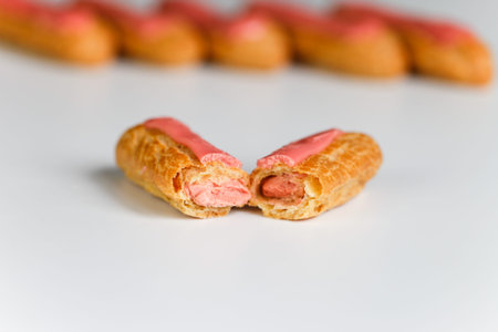 Eclairs on white background on white background
