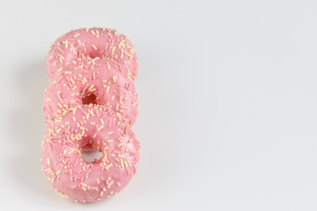 Pink donuts on plain backgroundの写真素材