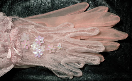 two pairs of pink gloves (for mom and daughter)の写真素材