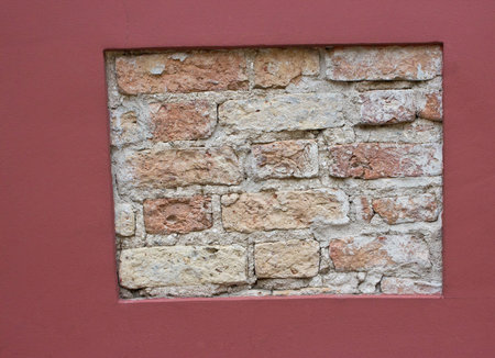 brick wall background in red frameの写真素材