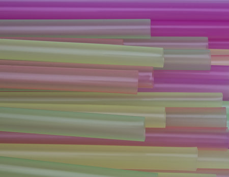 Abstract colorful background. Close-up of straw tubes. Colorful drinking straws background.の写真素材