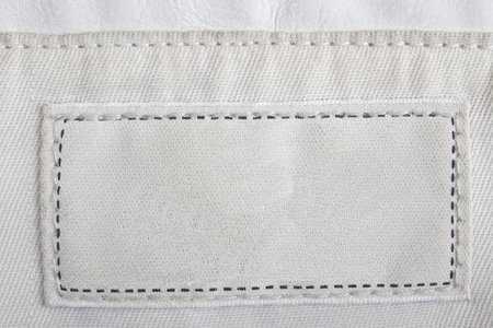 Blank textured label. Fragment of texture with pure label for your text.