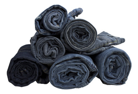 Jeans trousers stack closeup, isolated on white background の写真素材