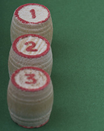 Wooden kegs for bingo on green backgroundの写真素材