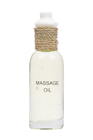 Massage oil bottle on white background の写真素材
