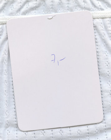 price tag label on white textured backgroundの写真素材