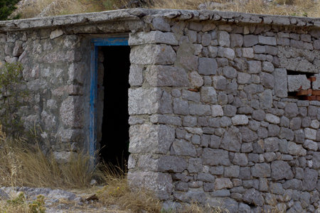 Blue door in old stone house, Croatiaの写真素材