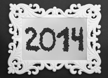 2014 in vintage white Frame on black backgroundの写真素材