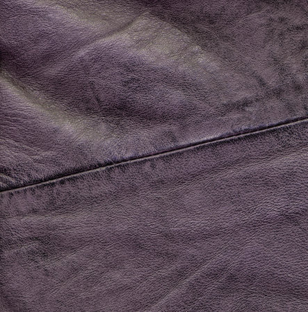 old violet leather texture as backgroundの写真素材