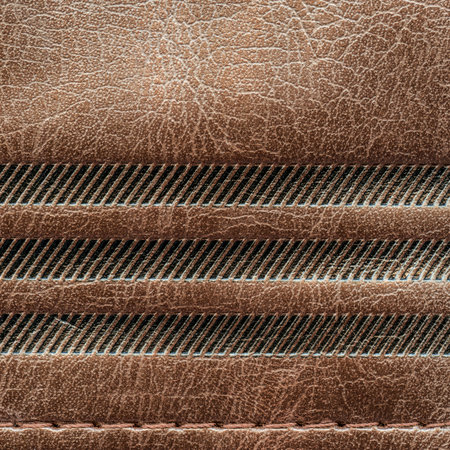 fragment of brown leather bagの写真素材