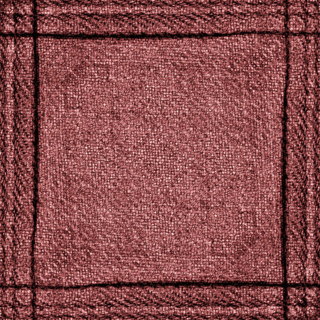 red  jeans background, seams in shape of the frameの写真素材