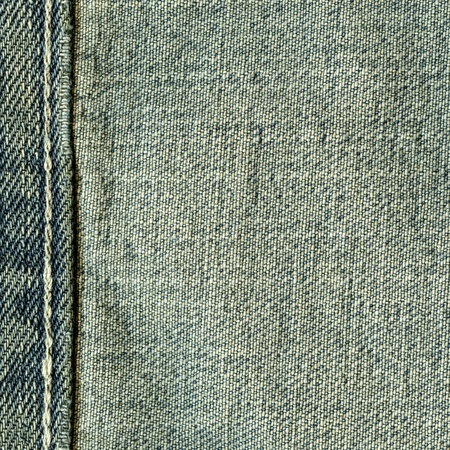 texture of old blue jeans wrong side, seamの写真素材