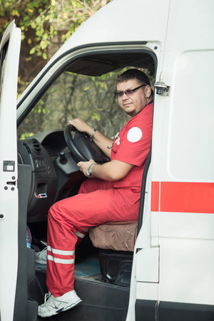 Portrait of a smiling doctor in the ambulance
