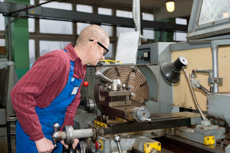 Man working for engineering production in the factoryの写真素材