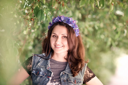 Outdoor portrait of a beautiful young brunette. parkの写真素材
