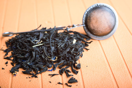 tea leaves and a metal teapot