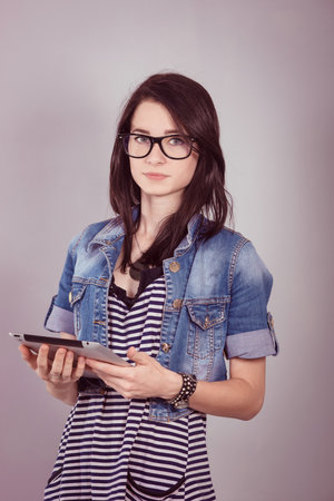 female student with a laptop in the studio.の写真素材