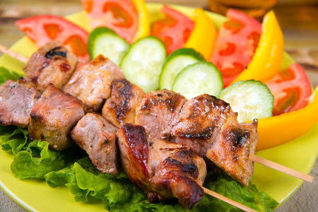 shashlik on a plate. salad and potatoesの写真素材
