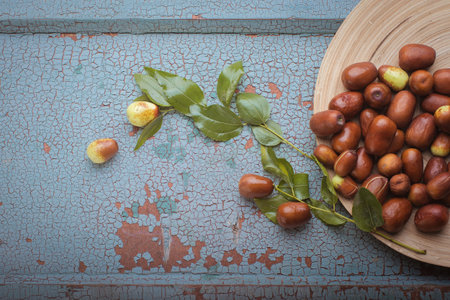Fresh Chinese jujube on a wooden backgroundの写真素材