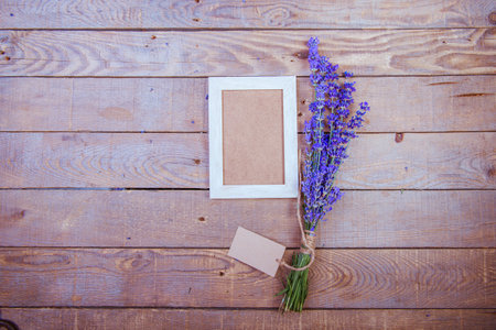 Blank photo frame and bouquet of lavenderの写真素材