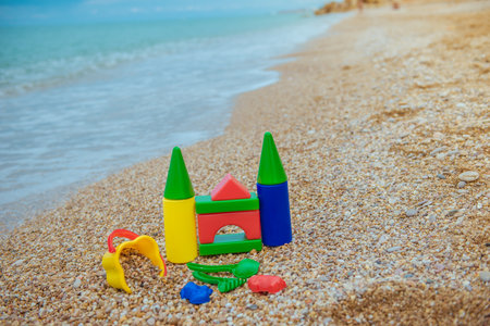 Children's toys on the beachの写真素材