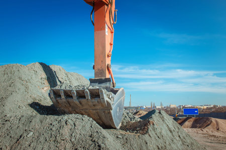 excavator bucket on the sky