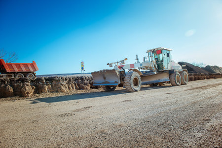 road grader on the sky backgroundの写真素材