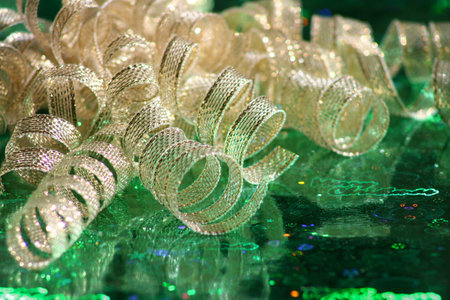 curly golden loops from a ribbon bowの写真素材
