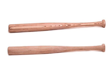 Two baseball bats made of plywood on white backgroundの写真素材