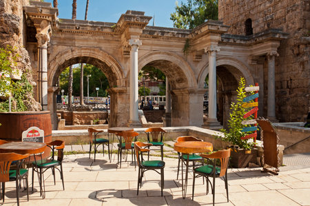 Antalya, Turkey - September 26, 2019: Street cafe near Hadrian's Gate, old town Kaleici in Antalya, Turkeyのeditorial素材