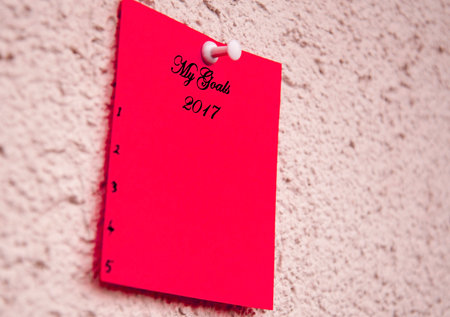 Red notepad on the wall With the words my goals for 2017の写真素材