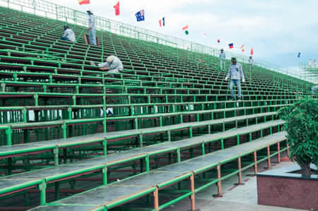 Workers are assembling a rostrum for the audience before the Festival of the Sea in Nha Trang, Vietnam.の写真素材