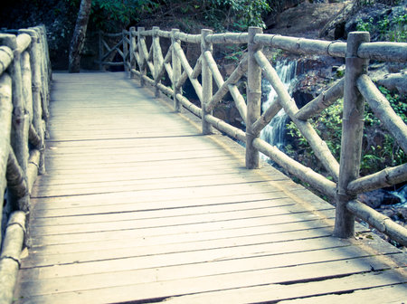 A bridge across the river at the waterfall in Vietnam.の写真素材