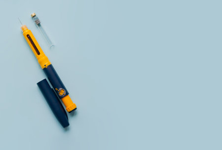 A syringe for subcutaneous injection of hormonal drugs in the IVF protocol (in vitro fertilization). Medical product in ampoule. Preparation for pregnancy.の写真素材