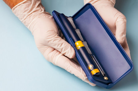 A box with a set of needles, an ampoule with a medical preparation and a syringe for subcutaneous injections of hormonal preparations in the IVF in vitro fertilization Preparation for pregnancy.の写真素材