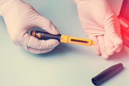 A man in medical gloves holds a syringe for subcutaneous injection of hormonal drugs in the IVF protocol in vitro fertilization Pregnancy, help to his wife. Toningの写真素材