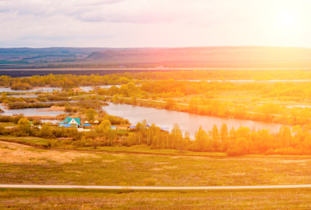 Autumn landscape. Bright autumn in the highlands. The lowland between the mountains. Bright sunlightの写真素材