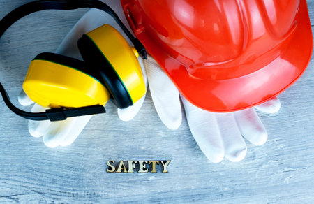 Construction helmet is a symbol of safety in the workplace. Set of tools. Safety concept Selective focus. DIY.の写真素材