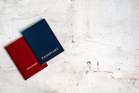 Two travelers passports red and blue. Travel conceptの写真素材