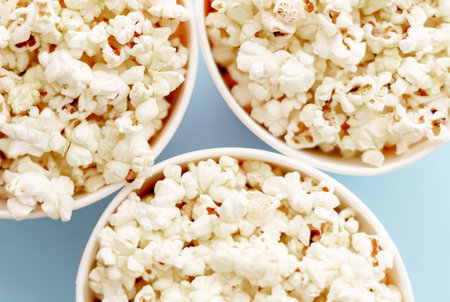 Popcorn in buckets. Three buckets with popcorn, top viewの写真素材
