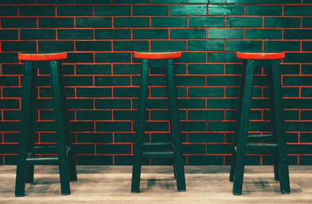 Black bar stools with a red seat. Bar furniture. The interior of the bar. Furniture for the receptionの写真素材