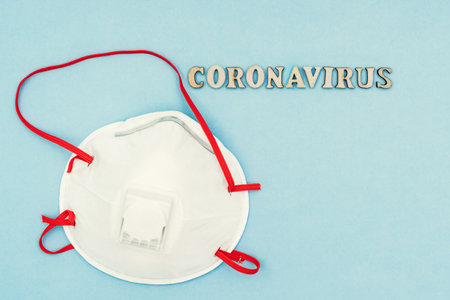 Coronavirus, covid-19. The inscription coronavirus on a blue background. Self-isolation and quarantine, personal protective equipment, phonendoscope and stethoscopeの写真素材
