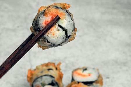 Traditional Japanese food, sushi and rolls. Ginger and wasabi, Chinese sticks.の写真素材