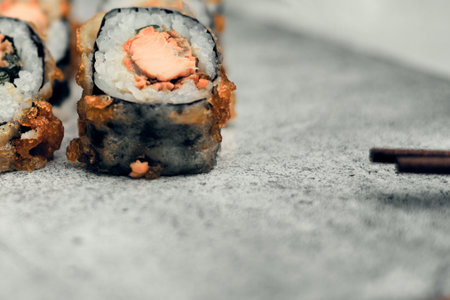 Traditional Japanese food, sushi and rolls. Ginger and wasabi, Chinese sticks.の写真素材