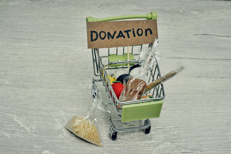 Donations food. Help products during a pandemic, charity. Cart with products.