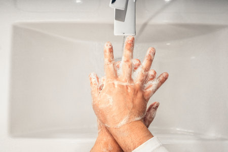 Coronavirus. Proper washing and handling of hands. Liquid antibacterial soap. Self-isolation and hygiene.の写真素材