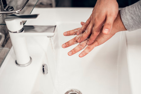 Coronavirus. Proper washing and handling of hands. Liquid antibacterial soap. Self-isolation and hygiene.の写真素材
