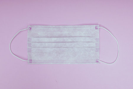 Protective medical mask. Personal protective equipment. Coronavirus pandemic.の写真素材