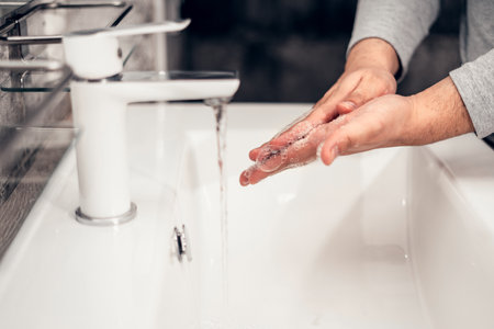 Coronavirus. Proper washing and handling of hands. Liquid antibacterial soap. Self-isolation and hygiene.の写真素材