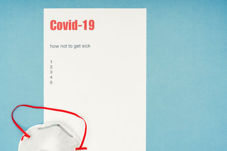 Coronavirus, Covid-19. How not to get infected, the inscription and paragraphs on a white sheet, personal protective equipment. Public awareness.の写真素材